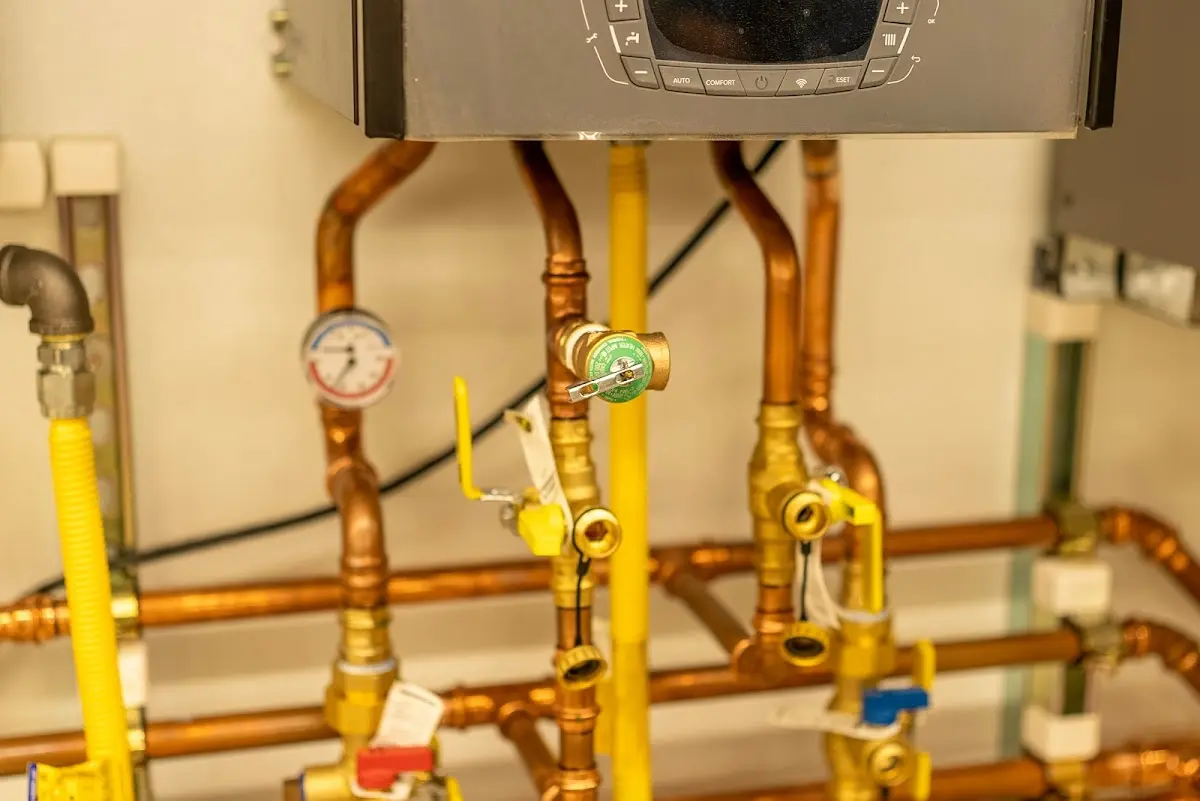 Licensed technician providing Backflow Prevention for a homeowner in Hamilton